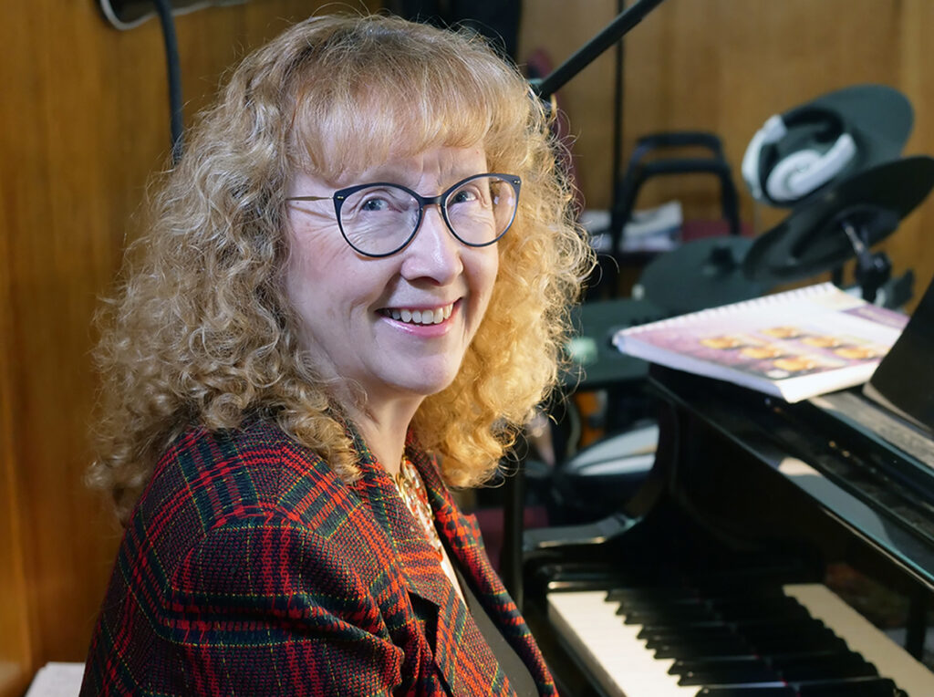 a photo of Heide sitting at the piano